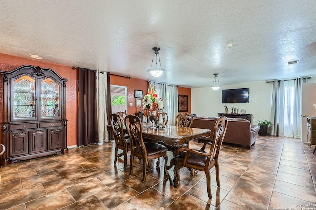 5402 Palamon Farm, San Antonio, TX 78228 - dining space with a textured ceiling and visible vents