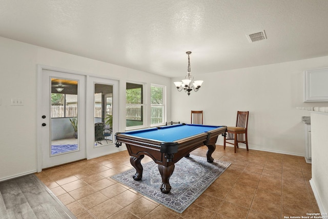 game room featuring baseboards, visible vents, an inviting chandelier, pool table, and light tile patterned floors