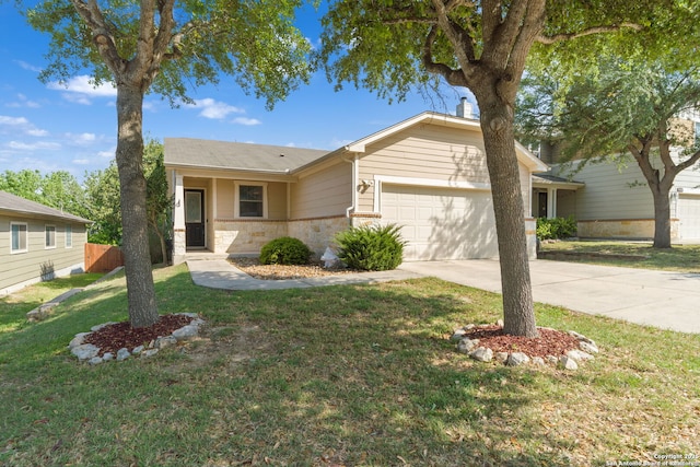 ranch-style home featuring brick siding, driveway, a front yard, and a garage