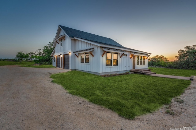 841 Postert, Floresville, TX 78114 - modern inspired farmhouse featuring a lawn, driveway, board and batten siding, a garage, and roof with shingles