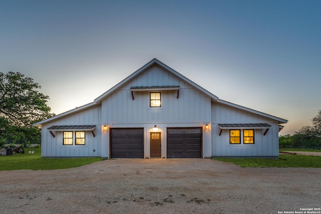 841 Postert, Floresville, TX 78114 - modern inspired farmhouse featuring a standing seam roof, board and batten siding, dirt driveway, and metal roof