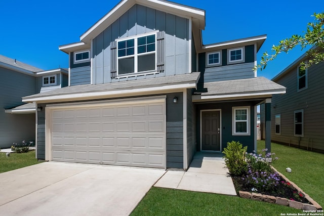 13711 Crossbow, San Antonio, TX 78253 - view of front of home featuring board and batten siding, a front lawn, driveway, and a garage