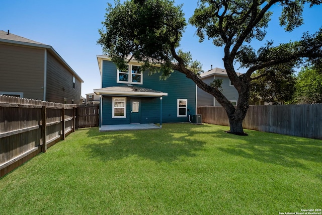 13711 Crossbow, San Antonio, TX 78253 - back of property featuring a lawn, a fenced backyard, a patio area, and central AC unit