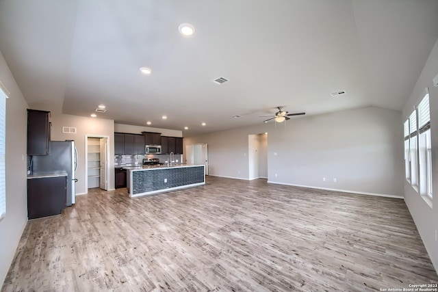 unfurnished living room with recessed lighting, visible vents, a ceiling fan, light wood-type flooring, and baseboards