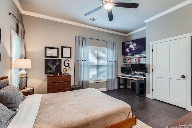 bedroom featuring visible vents, crown molding, baseboards, dark tile patterned flooring, and ceiling fan