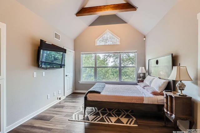 bedroom featuring beam ceiling, high vaulted ceiling, visible vents, baseboards, and wood finished floors