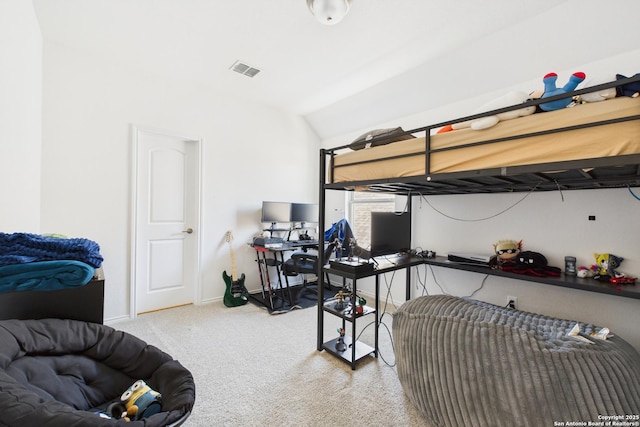 bedroom with carpet floors, lofted ceiling, visible vents, and baseboards