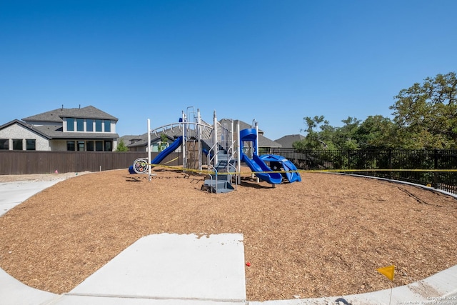 community jungle gym with fence