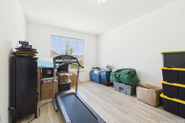 exercise area with wood finished floors
