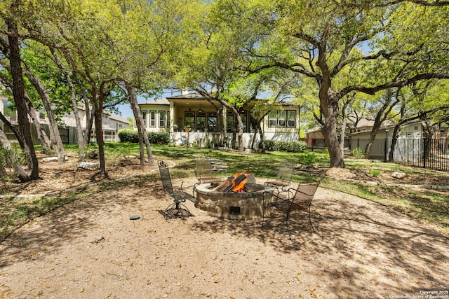 30336 Setterfeld Cir, Fair Oaks Ranch, TX 78015 - view of yard featuring an outdoor fire pit and fence