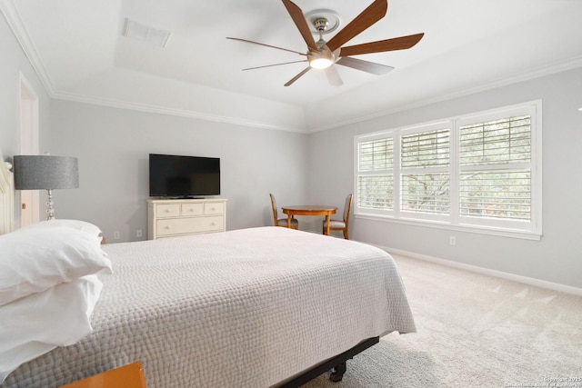 bedroom featuring crown molding, carpet, baseboards, visible vents, and a raised ceiling