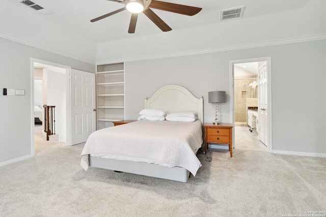carpeted bedroom with baseboards, visible vents, and ornamental molding