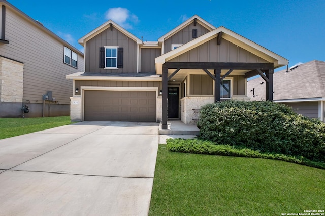 craftsman inspired home featuring board and batten siding, an attached garage, a front lawn, and concrete driveway