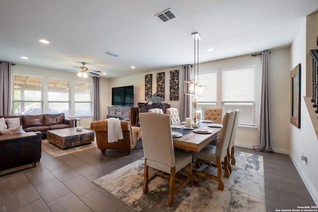 dining space with recessed lighting, visible vents, a ceiling fan, and baseboards
