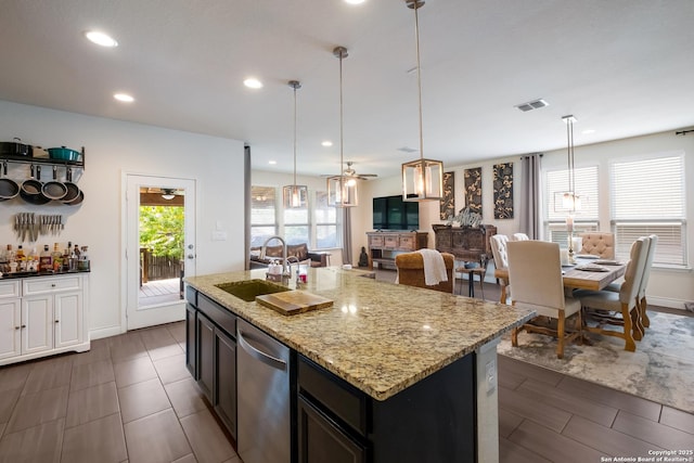 kitchen with stainless steel dishwasher, a ceiling fan, a sink, visible vents, and recessed lighting