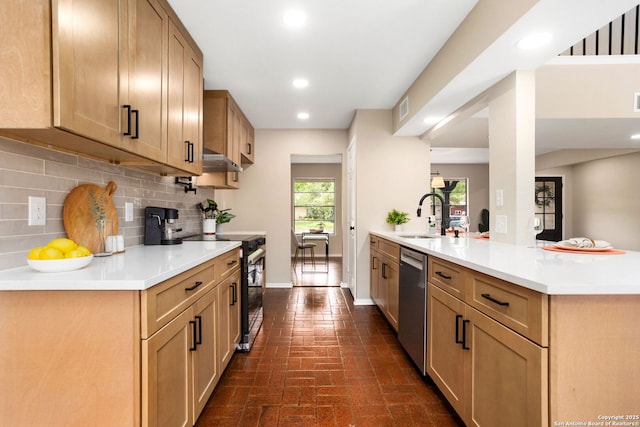 3102 Mindoro, San Antonio, TX 78217 - kitchen with a peninsula, a sink, black electric range oven, decorative backsplash, and dishwasher