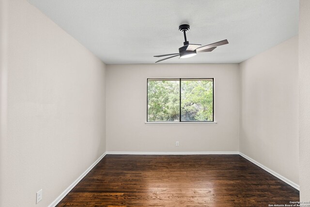 3102 Mindoro, San Antonio, TX 78217 - unfurnished room featuring baseboards, wood finished floors, and ceiling fan
