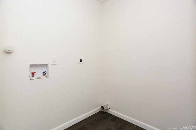 washroom with dark wood-style floors, laundry area, hookup for a washing machine, baseboards, and electric dryer hookup