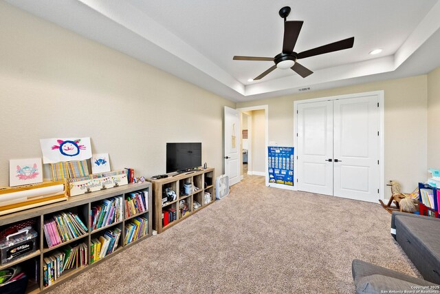 132 Ash Pkwy, La Vernia, TX 78121 - recreation room with recessed lighting, a tray ceiling, visible vents, carpet floors, and ceiling fan