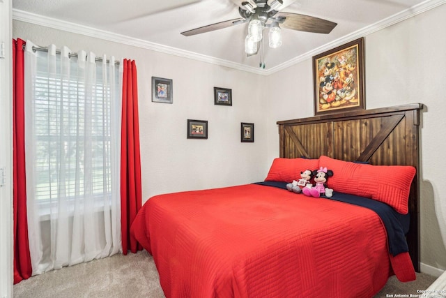 bedroom with carpet floors and crown molding