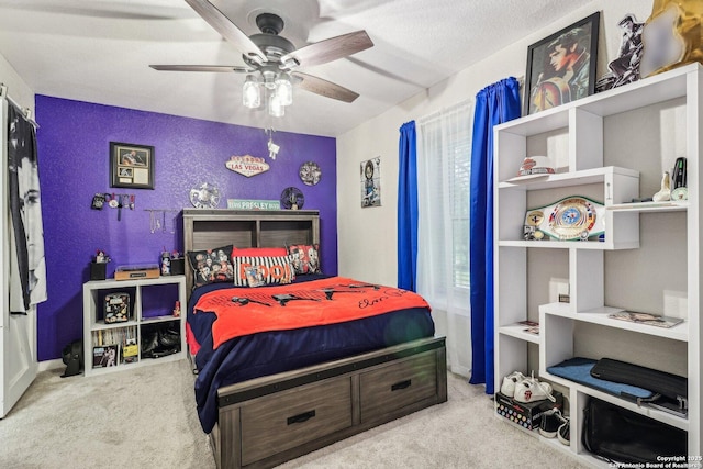 bedroom featuring carpet floors and a ceiling fan