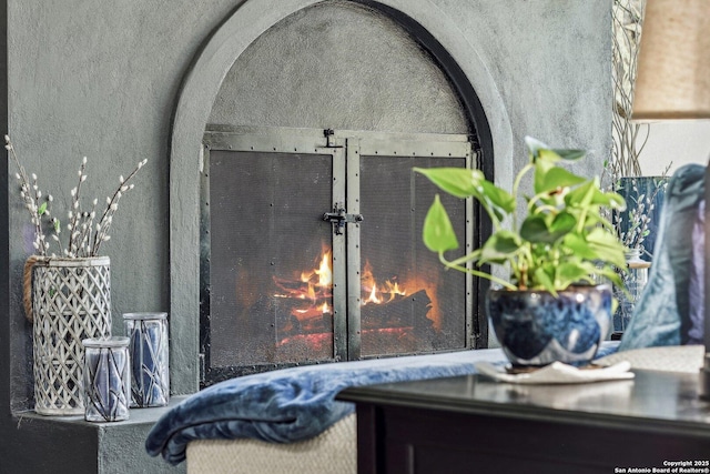 interior details with arched walkways and a textured wall