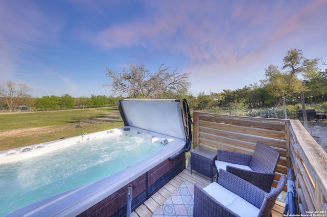283 N Second St, Harper, TX 78631 - deck at dusk with a lawn and hot tub deck surround