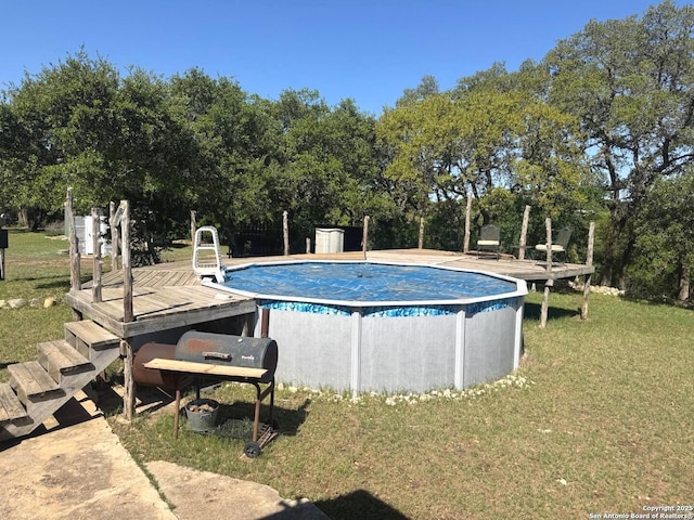pool featuring a lawn