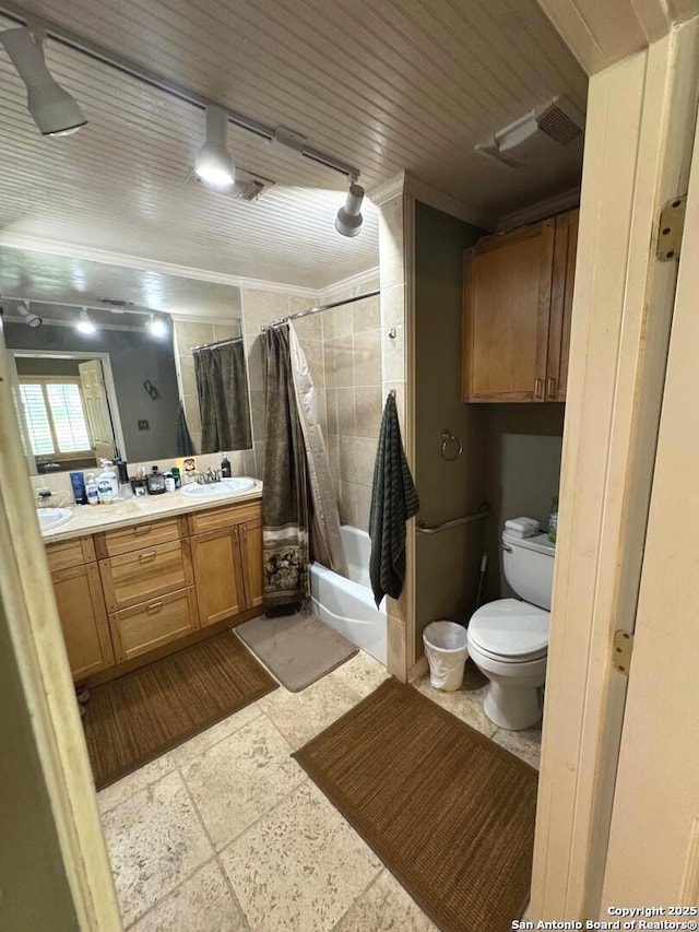 full bath featuring a sink, toilet, double vanity, shower / bathtub combination with curtain, and ornamental molding