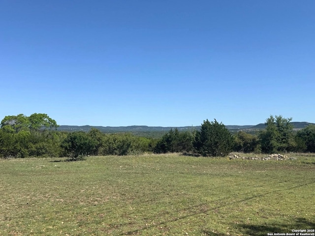 exterior space with a rural view