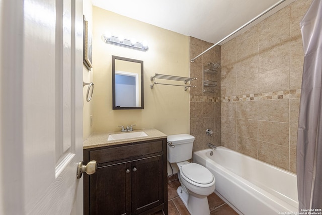full bathroom featuring tile patterned floors, shower / tub combo with curtain, toilet, and vanity