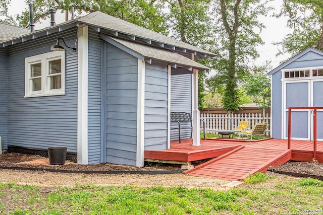 view of shed with fence