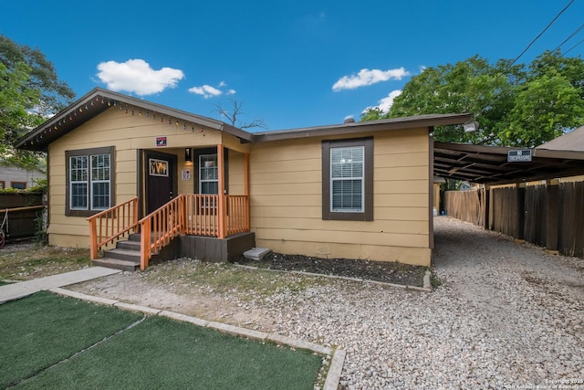 911 Porter St, San Antonio, TX 78210 - view of front of house featuring fence and a carport