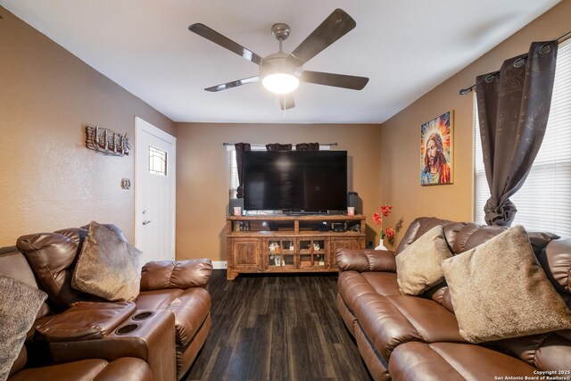 911 Porter St, San Antonio, TX 78210 - living area with baseboards, a ceiling fan, and wood finished floors