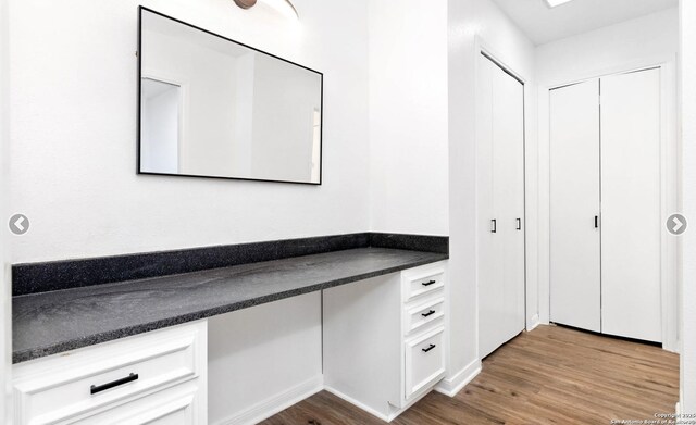 bathroom with wood finished floors