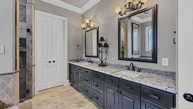 full bathroom with a sink, a notable chandelier, and ornamental molding