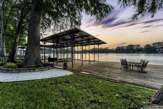 dock area with a water view