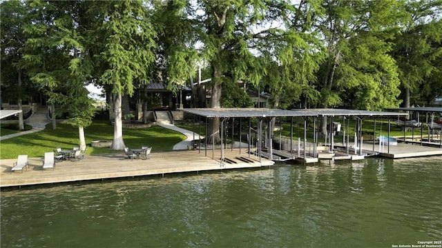 dock area with a water view