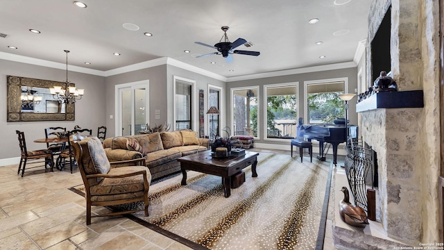 living area with ceiling fan with notable chandelier, stone tile flooring, baseboards, ornamental molding, and recessed lighting
