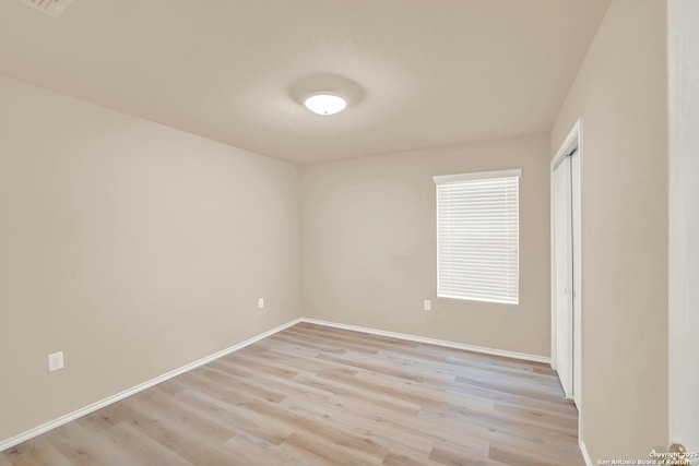 8906 Mission Brk, San Antonio, TX 78223 - empty room with light wood-type flooring and baseboards