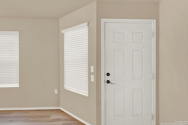 8906 Mission Brk, San Antonio, TX 78223 - entryway with light wood finished floors and baseboards