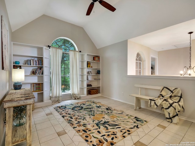 286 Iron Kettle, Universal City, TX 78148 - sitting room with ceiling fan with notable chandelier, vaulted ceiling, and tile patterned flooring
