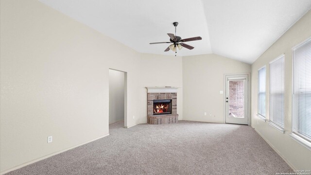 6430 Ithaca Fls, San Antonio, TX 78239 - unfurnished living room featuring baseboards, light colored carpet, lofted ceiling, ceiling fan, and a fireplace