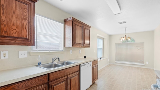 6430 Ithaca Fls, San Antonio, TX 78239 - kitchen featuring a sink, visible vents, dishwasher, light countertops, and hanging light fixtures
