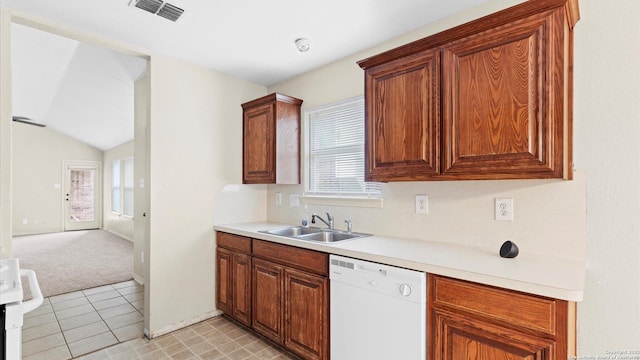 6430 Ithaca Fls, San Antonio, TX 78239 - kitchen featuring light countertops, dishwasher, visible vents, a sink, and light colored carpet