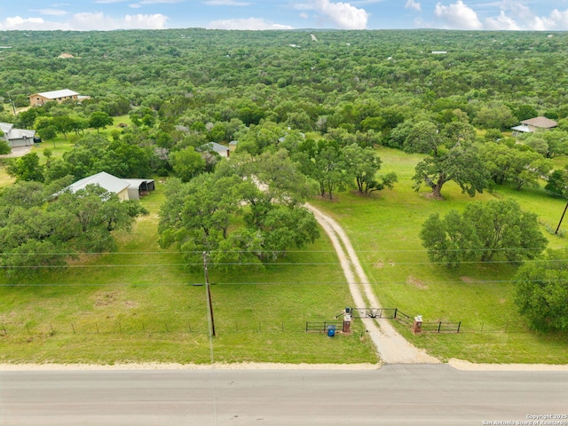 154 Elk Rdg, Canyon Lake, TX 78133 - drone / aerial view featuring a forest view