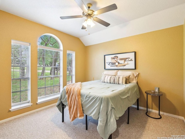 154 Elk Rdg, Canyon Lake, TX 78133 - bedroom with vaulted ceiling, carpet, a ceiling fan, and baseboards