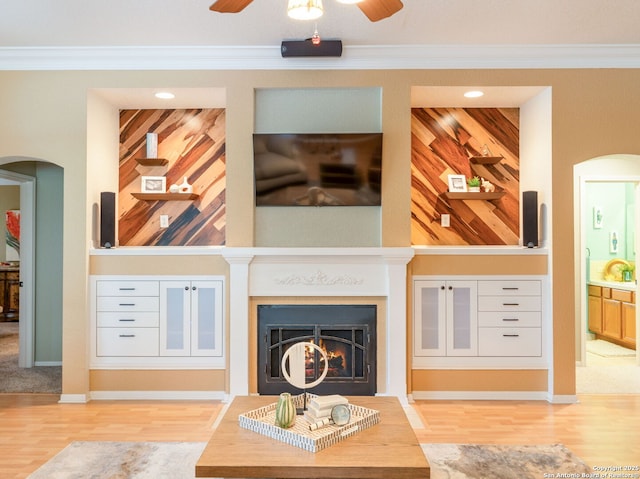 154 Elk Rdg, Canyon Lake, TX 78133 - living area with ceiling fan, arched walkways, and ornamental molding