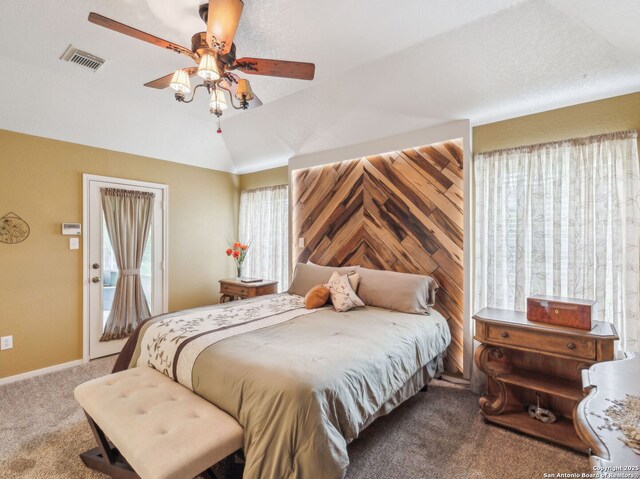 154 Elk Rdg, Canyon Lake, TX 78133 - carpeted bedroom with a ceiling fan, lofted ceiling, access to outside, and visible vents