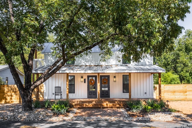 212 Peach, Fredericksburg, TX 78624 - modern farmhouse featuring board and batten siding, fence, and covered porch